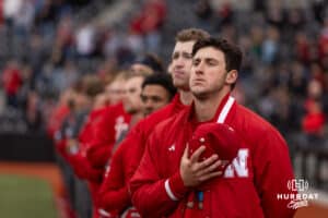 Huskers lined up for the National Anthem against the Omaha Mavericks during a college baseball game Wednesday, April 2, 2025 in Omaha, Nebraska. Photo by John S. Peterson.