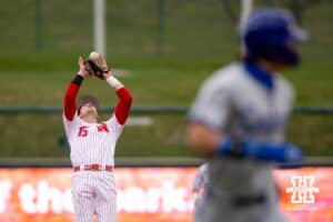 Nebraska Cornhusker infielder Dylan Carey (15) makes an out to end the top of the first against the Creighton Bluejays during a college baseball game Tuesday, April 1, 2025 in Lincoln, Nebraska. Photo by John S. Peterson.