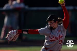 Nebraska Cornhusker Hannah Camenzind (9) throws a pitch against Purdue Boilermakers during a college softball game Monday, March 31, 2025 in Lincoln, Nebraska. Photo by John S. Peterson.