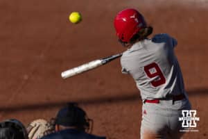 Nebraska Cornhusker Hannah Camenzind (9) hits a homerun against the Purdue Boilermakers in the fifth inning during a college softball game Monday, March 31, 2025 in Lincoln, Nebraska. Photo by John S. Peterson.