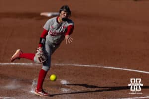 Nebraska Cornhusker Hannah Camenzind (9) throws a pitch against the Purdue Boilermakers in the fifth inning during a college softball game Monday, March 31, 2025 in Lincoln, Nebraska. Photo by John S. Peterson.