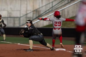 Nebraska Cornhusker Samantha Bland (29) safe at first against the Purdue Boilermakers during a college softball game Monday, March 31, 2025 in Lincoln, Nebraska. Photo by John S. Peterson.