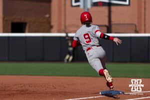 Nebraska Cornhusker Hannah Camenzind (9) rounds first as the Purdue Boilermaker outfiled watches the ball go over the wall in the first inning during a college softball game Monday, March 31, 2025 in Lincoln, Nebraska. Photo by John S. Peterson.
