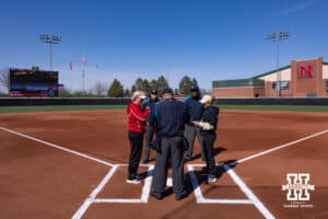 Nebraska Cornhusker head coach Rhonda Revelle and Purdue Boilermaker head coach Magali Frezzotti meet at home before a college softball game Monday, March 31, 2025 in Lincoln, Nebraska. Photo by John S. Peterson.