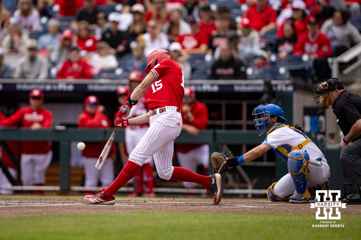 BIg Ten Baseball Nebraska v UCLA | 20250525 Nebraska Cornhusker infielder Dylan Carey (15) doubles in the second inning scoring Swanson against the UCLA Bruins during the Big Ten Baseball Tournament Championship Game on Sunday, May 25, 2025 in Omaha, Nebraska. Photo by John S. Peterson.