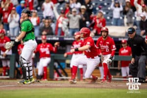 Nebraska Cornhusker outfielder Gabe Swansen (44) slides home against the Oregon Ducks in the fifht inning during the Big Ten Baseball Tournament on Saturday, May 24, 2025 in Omaha, Nebraska. Photo by John S. Peterson.