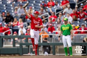 Nebraska Cornhusker utility Case Sanderson (14) makes out on a double-play in the fifth inning against the Oregon Ducks during the Big Ten Baseball Tournament on Saturday, May 24, 2025 in Omaha, Nebraska. Photo by John S. Peterson.