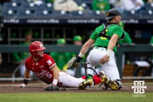 Nebraska Cornhusker outfielder Robby Bolin (5) scores a run in the second inning against the Oregon Ducks during the Big Ten Baseball Tournament on Saturday, May 24, 2025 in Omaha, Nebraska. Photo by John S. Peterson.