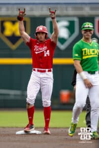 Nebraska Cornhusker Case Sanderson (14) doubles the in first inning against the Oregon Ducks during the Big Ten Baseball Tournament on Saturday, May 24, 2025 in Omaha, Nebraska. Photo by John S. Peterson.