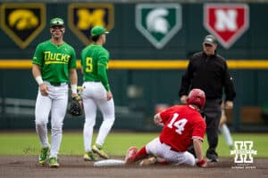 Nebraska Cornhusker utility Case Sanderson (14) doubles the in first inning against the Oregon Ducks during the Big Ten Baseball Tournament on Saturday, May 24, 2025 in Omaha, Nebraska. Photo by John S. Peterson.8