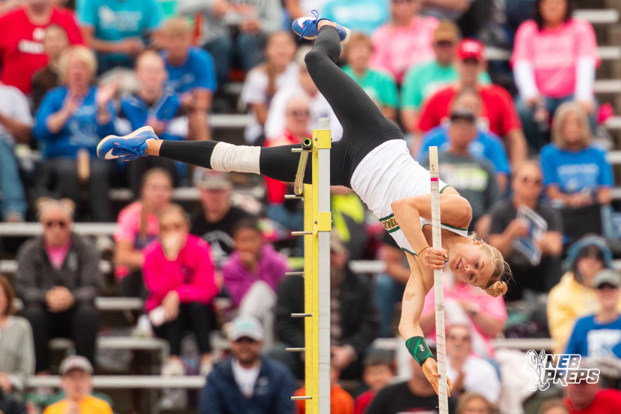 Alyssa Onnen of Kearney Catholic sets a state and meet record of 12-09.25 during the NSAA State Track and Field Championships on Friday, May 23, 2025 in Omaha, Nebraska. Photo by Mac Johnson.