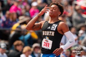 Omaha North’s Darion Jones reacts after winning his 100 meter hurdles prelim heat during the NSAA State Track and Field Championships on Wednesday, May 21, 2025 in Omaha, Nebraska. Photo by Mac Johnson.