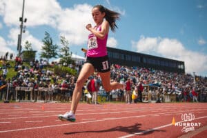 Millard West’s Litzey Fredette runs during the 4x800 relays during the NSAA State Track and Field Championships on Wednesday, May 21, 2025 in Omaha, Nebraska. Photo by Mac Johnson.