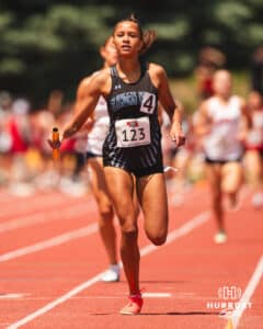 Elkhorn North’s Leah Robinson crosses the finish line in the 4x800m relay during the NSAA State Track and Field Championships on Wednesday, May 21, 2025 in Omaha, Nebraska. Photo by Mac Johnson.