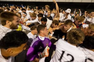 Westside celebrates with their student section after the NSAA Boys Class A soccer finals on Tuesday, May 20, 2025, in Omaha, Nebraska. Photo by Braden Cochran.
