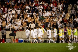 Westside celebrates with a rowdy student section after the game sealing goal during the NSAA Boys Class A soccer finals on Tuesday, May 20, 2025, in Omaha, Nebraska. Photo by Braden Cochran.