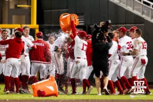 Nebraska Cornhusker outfielder Robby Bolin (5) and teammates celebrates a walk-off single during the Big Ten Baseball Tournament on Tuesday, May 20, 2025 in Omaha, Nebraska. Photo by Mac Johnson.