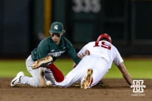 Nebraska Cornhusker Dylan Carey (15) steals second in the tenth inning against the Michigan State Spartans during the Big Ten Baseball Tournament on Tuesday, May 20, 2025 in Omaha, Nebraska. Photo by John S. Peterson.