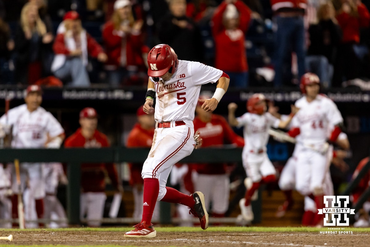 Nebraska Cornhusker Robby Bolin (5) scores the tying run against the Michigan State Spartans in the ninth inning during the Big Ten Baseball Tournament on Tuesday, May 20, 2025 in Omaha, Nebraska. Photo by John S. Peterson.