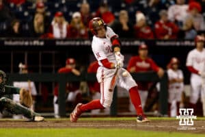 Nebraska Cornhusker Josh Overbeek (4) drives in Robby Bolin to tie Michigan State Spartans in the ninth inning during the Big Ten Baseball Tournament on Tuesday, May 20, 2025 in Omaha, Nebraska. Photo by John S. Peterson.