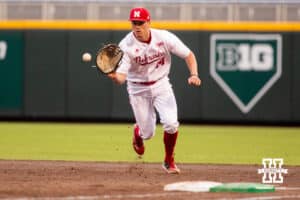 Nebraska Cornhusker utility Case Sanderson (14) fields a ball during the Big Ten Baseball Tournament on Tuesday, May 20, 2025 in Omaha, Nebraska. Photo by Mac Johnson.