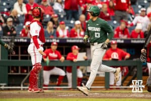 Michigan State Spartan outfielder Parker Picot (13) crosses home plate during the Big Ten Baseball Tournament on Tuesday, May 20, 2025 in Omaha, Nebraska. Photo by Mac Johnson.