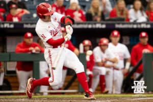 Nebraska Cornhusker outfielder Gabe Swansen (44) hits an RBI pop-out during the Big Ten Baseball Tournament on Tuesday, May 20, 2025 in Omaha, Nebraska. Photo by Mac Johnson.