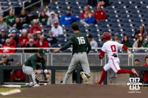Nebraska Cornhusker Cayden Brumbaugh (0) beats Michigan State Spartan infielder Sam Busch (24) at first base in the first inning during the Big Ten Baseball Tournament on Tuesday, May 20, 2025 in Omaha, Nebraska. Photo by John S. Peterson.