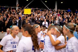 Omaha Marian fans cheer on their fallen Crusaders after the NSAA Girls Class A soccer finals on Monday, May 19, 2025, in Omaha, Nebraska. Photo by Braden Cochran.