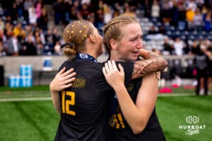 Gretna East teammates Kendall Dobberstein (12) and Madison Shelburne (11) embrace in celebration after the NSAA Girls Class B soccer finals on Monday, May 19, 2025, in Omaha, Nebraska. Photo by Braden Cochran.