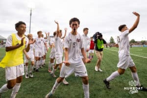 Westside team and Alejandro Nolasco-Lopez (5) celebrate their win against Creighton Prep after the NSAA Boys Class A soccer semi-finals on Friday, May 16, 2025, in Omaha, Nebraska. Photo by Braden Cochran.