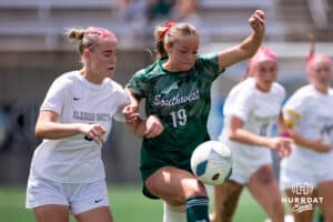 Lincoln Southwest's Kianna Perez (19) makes a move around Elkhorn South's Aubrey Marsh (5) during the NSAA Girls Class A soccer semi-finals on Friday, May 16, 2025, in Omaha, Nebraska. Photo by Braden Cochran.