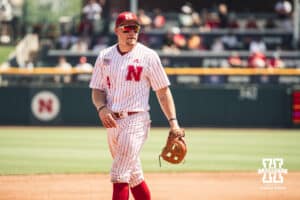 Nebraska Cornhusker infielder Josh Overbeek (4) playing at third base against Michigan during a college baseball game Saturday, May 10, 2025, in Lincoln, Nebraska. Photo by Jansen Coburn.