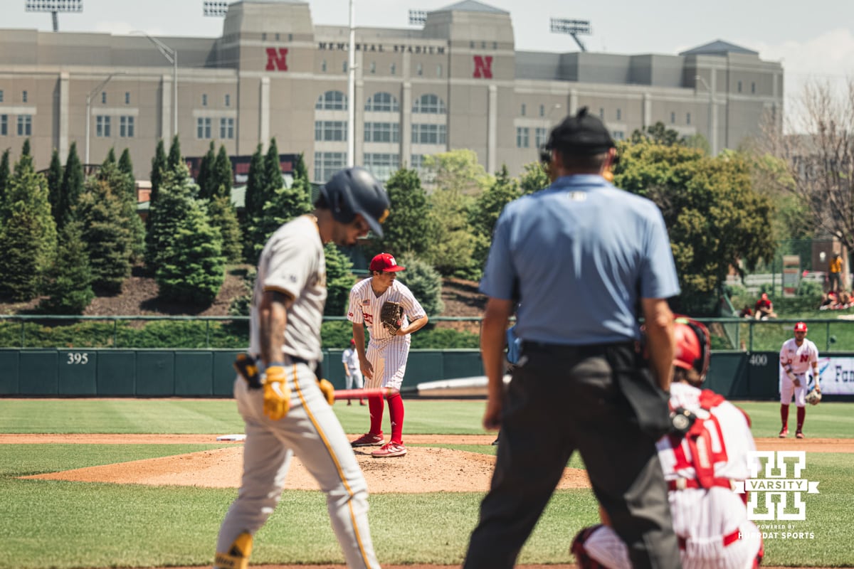 Nebraska Cornhusker pitcher Ty Horn (20) looks to first against Michigan during a college baseball game Saturday, May 10, 2025, in Lincoln, Nebraska. Photo by Jansen Coburn.