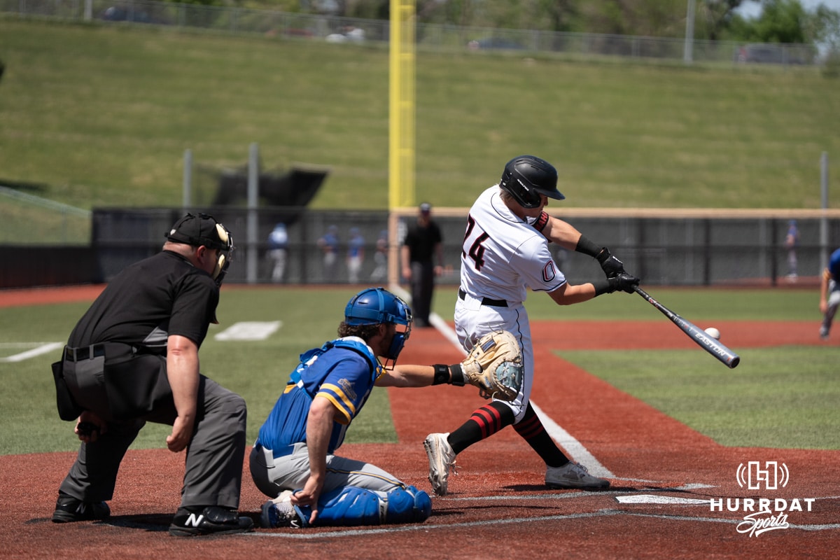 Omaha Mavericks Drew Borner hits during a college baseball game against South Dakota State on May 11th, 2025 in Omaha, Nebraska. Photo by Brandon Tiedemann.