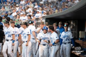 Creighton Bluejays dugout celebrates after a run during a baseball game against Xavier on May 9th, 2025 in Omaha Nebraska. Photo by Brandon Tiedemann.