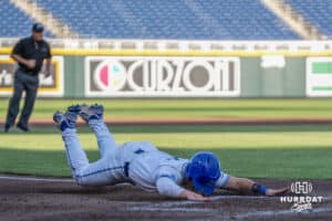 Creighton Bluejays Matt Scherrman slides during a baseball game against Xavier on May 9th, 2025 in Omaha Nebraska. Photo by Brandon Tiedemann.