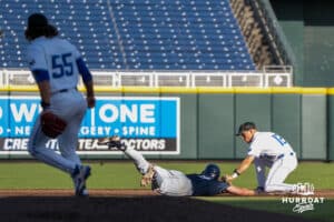 Creighton Bluejays Nick Venteicher tags a runner during a baseball game against Xavier on May 9th, 2025 in Omaha Nebraska. Photo by Brandon Tiedemann.