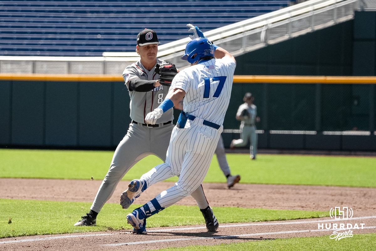 Omaha Mavericks Isaac Cychosz tags Will MacLean during a baseball game Tuesday , April 29th, 2025 in Omaha, Nebraska. Photo by Brandon Tiedemann.