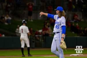 Creighton Bluejay pitcher Garrett Langrell (45) gives the Nebraska Cornhuskers a thumbs down after they take the win during a college baseball game on Tuesday, May 6, 2025 in Lincoln, Nebraska. Photo by John S. Peterson.