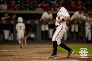 Nebraska Cornhusker Josh Overbeek (4) scores in the ninth inning against the Creighton Bluejays during a college baseball game on Tuesday, May 6, 2025 in Lincoln, Nebraska. Photo by John S. Peterson.