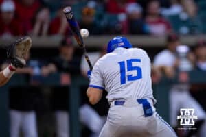 Creighton Bluejay Kyle Hess (15) gets hit in the head by a pitch in the eighth inning against the Nebraska Cornhuskers during a college baseball game on Tuesday, May 6, 2025 in Lincoln, Nebraska. Photo by John S. Peterson.