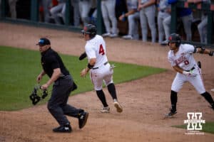 Nebraska Cornhusker infielder Josh Overbeek (4) scores against the Creighton Bluejays in the fifth inning during a college baseball game on Tuesday, May 6, 2025 in Lincoln, Nebraska. Photo by John S. Peterson.