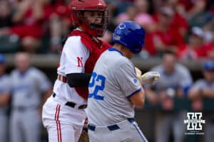 Nebraska Cornhusker catcher Hogan Helligso (10) collides with Creighton Bluejay outfielder Dakota Duffalo (22) going after the ball during a college baseball game on Tuesday, May 6, 2025 in Lincoln, Nebraska. Photo by John S. Peterson.