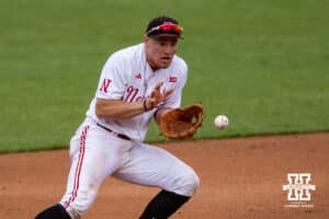 Nebraska Cornhusker infielder Josh Overbeek (4) fields the ball to throw to first base for an out against the Creighton Bluejays in the second inning during a college baseball game on Tuesday, May 6, 2025 in Lincoln, Nebraska. Photo by John S. Peterson.