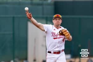 Nebraska Cornhusker infielder Josh Overbeek (4) throws to first for an out in the first inning against the Creighton Bluejays during a college baseball game on Tuesday, May 6, 2025 in Lincoln, Nebraska. Photo by John S. Peterson.