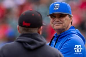 Creighton Bluejays head coach Ed Servais meeting with Nebraska Cornhuskers head coach Will Bolt during a college baseball game on Tuesday, May 6, 2025 in Lincoln, Nebraska. Photo by John S. Peterson.