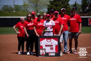 Nebraska Cornhusker Mckinley Malecha poses with her family for a photo during the Senior Day celebraion after the win over the Maryland Terrapins during a college softball game on Sunday, May 4, 2025 in Lincoln, Nebraska. Photo by John S. Peterson.