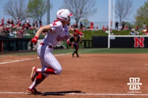 Nebraska Cornhusker Ava Kuszak (7) watches the ball go over the wall for a two run home run for a the walk-off win in the sixth inning against the Maryland Terrapinsduring a college softball game on Sunday, May 4, 2025 in Lincoln, Nebraska. Photo by John S. Peterson.