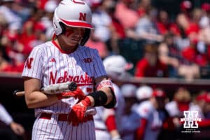 Nebraska Cornhusker Ava Kuszak (7) tightens up her glove before an bat against the Maryland Terrapins in the fifith inning during a college softball game on Sunday, May 4, 2025 in Lincoln, Nebraska. Photo by John S. Peterson.